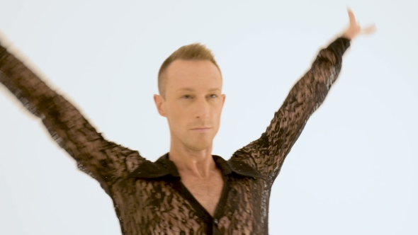 A Man Beautifully Dances on a White Background
