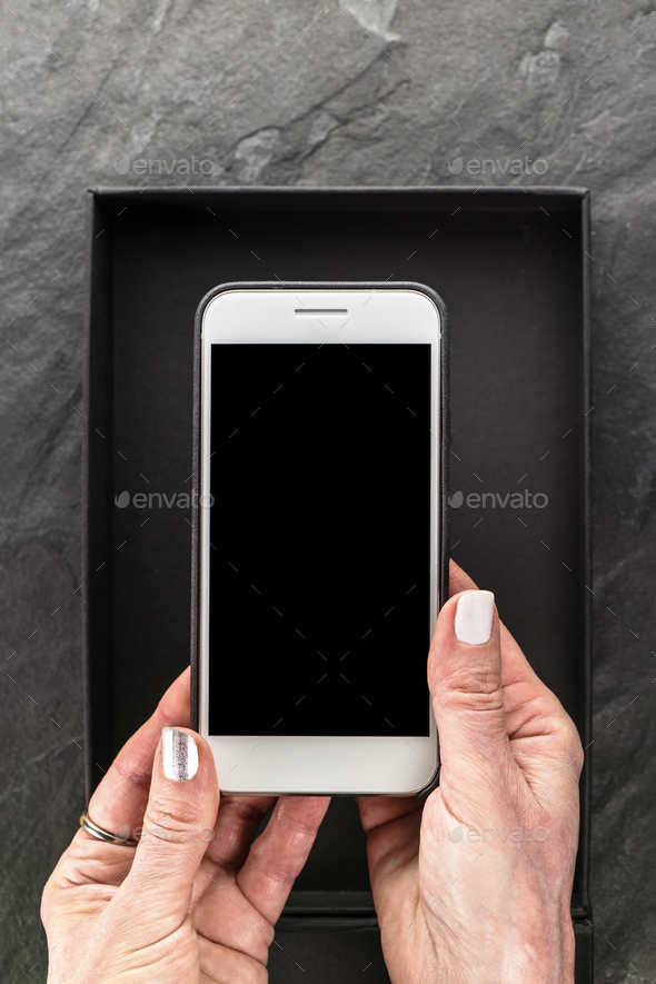 Black Friday, box and phone in hands free space Stock Photo by Deniskarpenkov