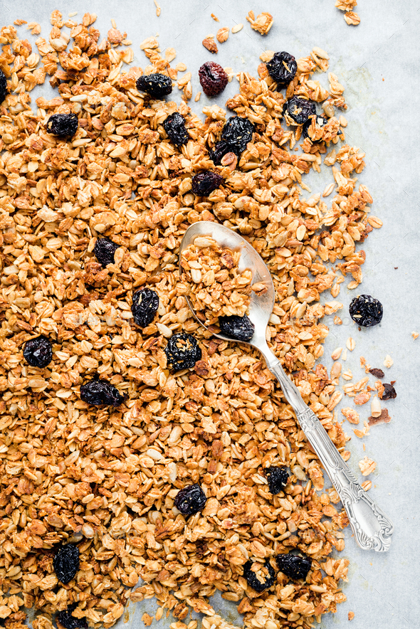 Homemade oat, cherry and coconut granola Stock Photo by sonyakamoz