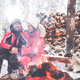 Couple near bonfire in winter landscape - PhotoDune Item for Sale