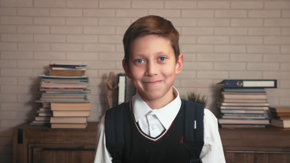 Happy Schoolboy Jumps Showing His Joy From Education