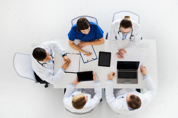 doctors with cardiogram and computers at hospital - Stock Photo - Images