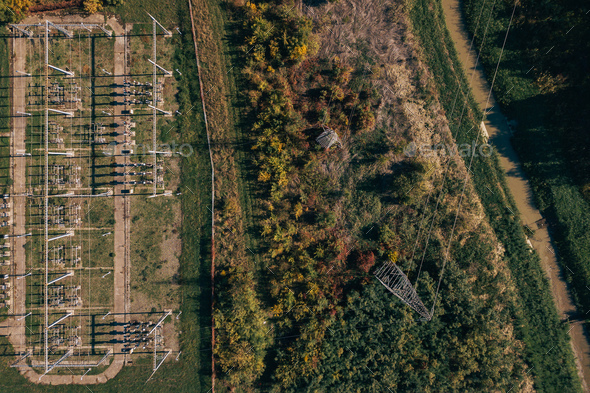 Aerial view of electricity power substation plant and pylons - Stock Photo - Images