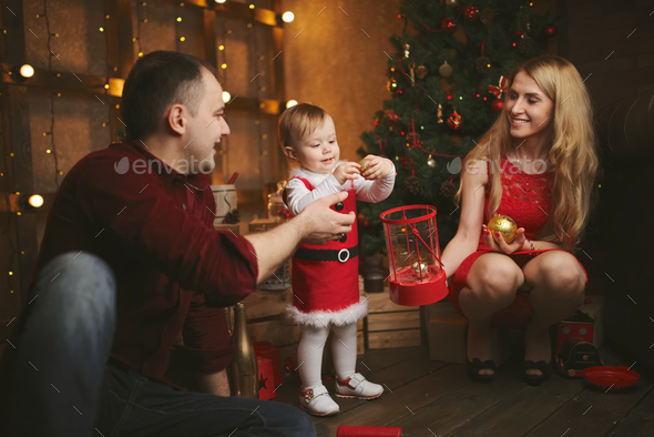 Family Decorating Christmas Tree At Home Stock Photo By Ababaka Photodune - A Family By Decorating Christmas Tree At Home Family Decorating Christmas Tree At Home Stock Photo By Ababaka Photodune - A Family By Decorating Christmas Tree At Home