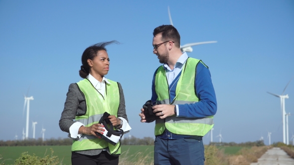 Two Wind Farm Engineers in Virtual Reality Googles alt