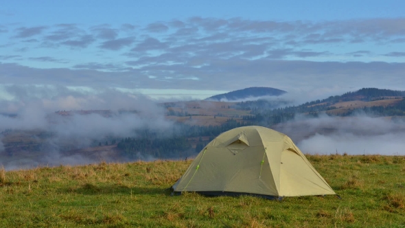 Green Tent in High Mountains