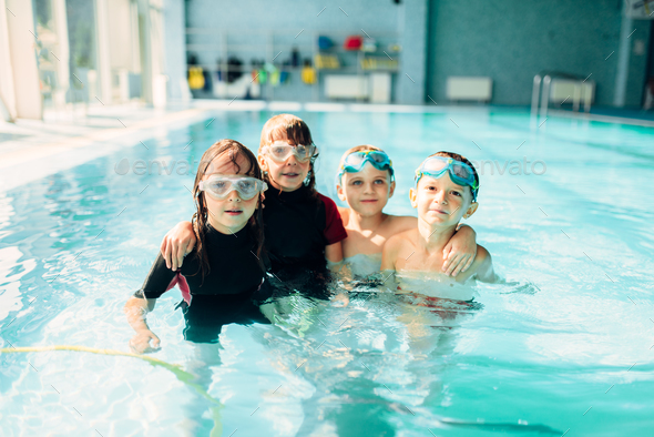 Friendly children with swimming goggles. - Stock Photo - Images