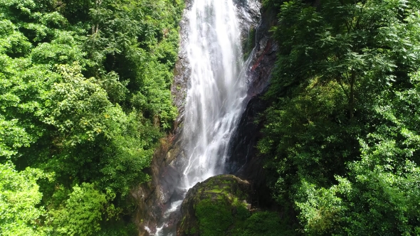 Aerial View From the Bottom Up of the Waterfall Flows Down the Slope on Adam's Peak in Sri Lanka