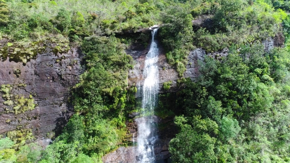 Aerial View of Water Flows Down the Rocky Mountain Break of Adam's Peak ...