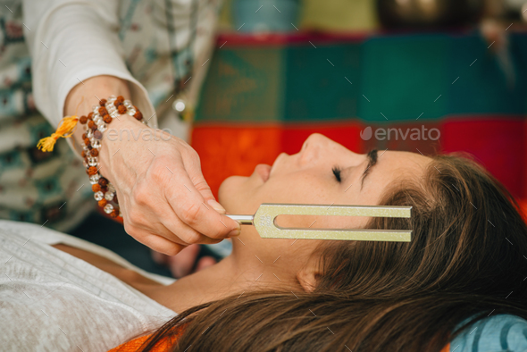 Tuning fork in sound therapy - Stock Photo - Images