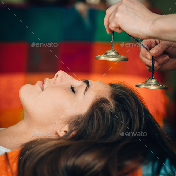 Tibetan bells in sound therapy - Stock Photo - Images