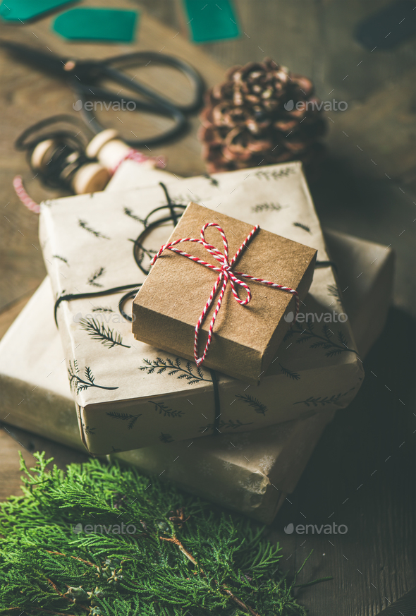 Gift boxes, rope, fur branches, scissors, selective focus - Stock Photo - Images