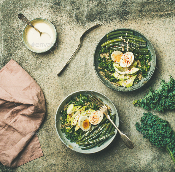 Healthy vegetarian breakfast bowls flat-lay over grey background - Stock Photo - Images