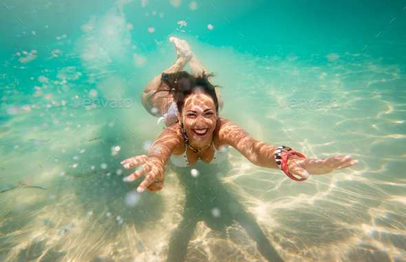 Cute Girl Swimming Under Sea - Stock Photo - Images