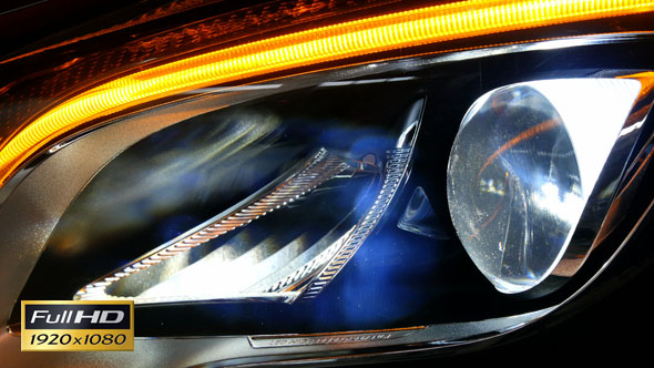 LED Headlight of a Car Shining