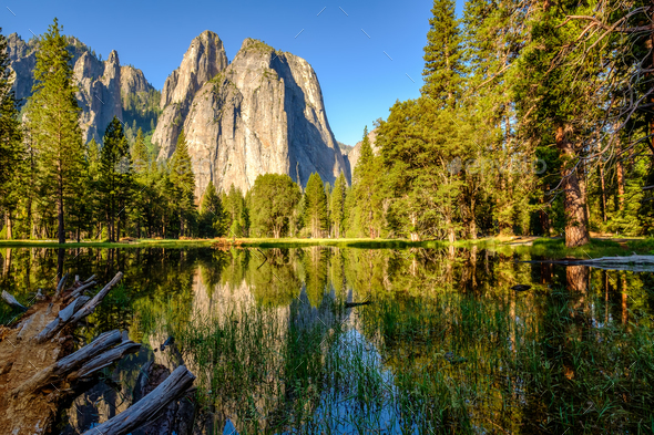 Middle Cathedral Rock Reflecting In Merced River At Yosemite Stock 