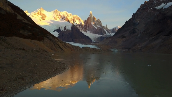 Flight Over Cerro Torre Mountain and Laguna Torre at Sunrise. Patagonia, Argentina alt