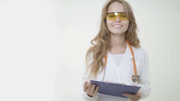 Cute Female Doctor with Clipboard
