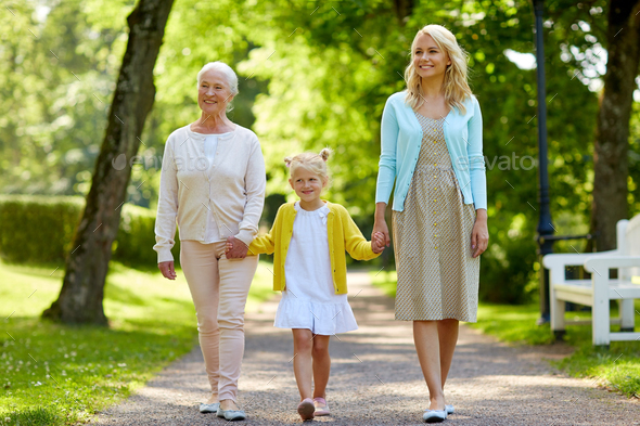 happy mother, daughter and grandmother at park