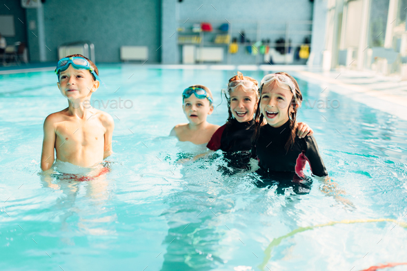 Friendly children with swimming goggles. - Stock Photo - Images