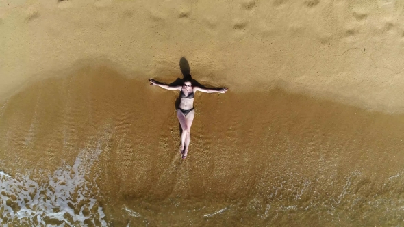 Aerial View of Beatiful Girl Who Having Subathe on the Sandy Beach in Sri Lanka