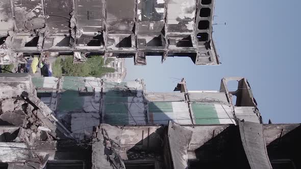 Vertical Video of the Consequences of the War in Ukraine  a Destroyed Building alt