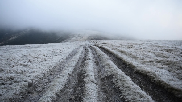 The Road in the High Mountains Covered with Hoarfrost