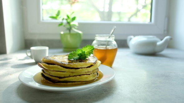 The Man Turns the Pancake