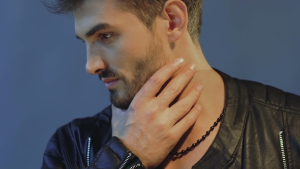 Sensual Passionate Look at Camera of Handsome Man on Background alt