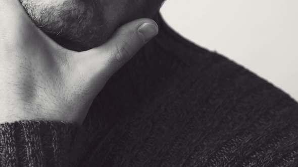 Passionate Look at Camera of Handsome Bearded Man in Pose. Black and White alt