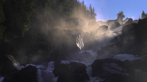 Footage of a Rocky Waterfall in a Backlight