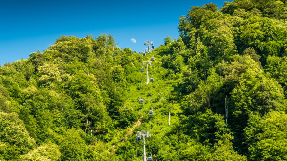 Ski Lifts Against The Sky And The Moon alt