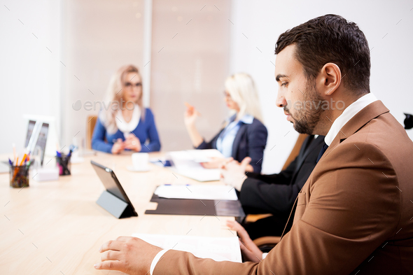 Team of business people at meeting in the conference room - Stock Photo - Images