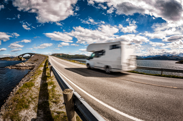 Caravan car RV travels on the highway Atlantic Ocean Road Norway - Stock Photo - Images