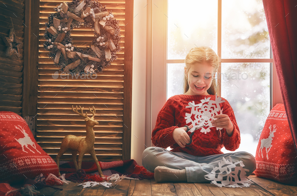 girl sitting by the window - Stock Photo - Images