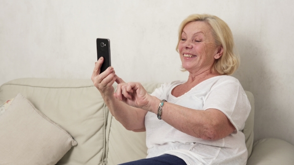 Old Woman Making a Selfie