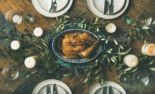 Holiday table setting for party, gathering or celebration roast chicken