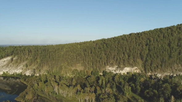 Aerial View Over Green Forest and Lake on Summer Day., Stock Footage