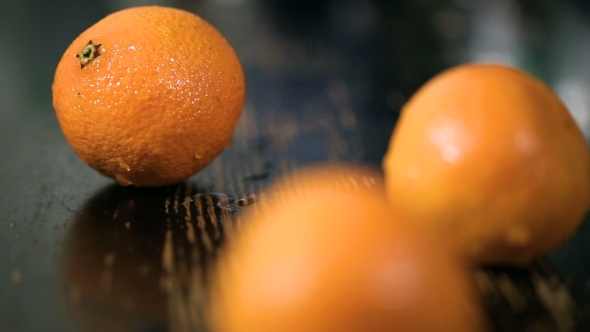 Organic Tangerines on Wood Table