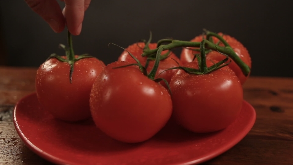 Take One Ripe Tomato From a Red Plate, and Then Put Back