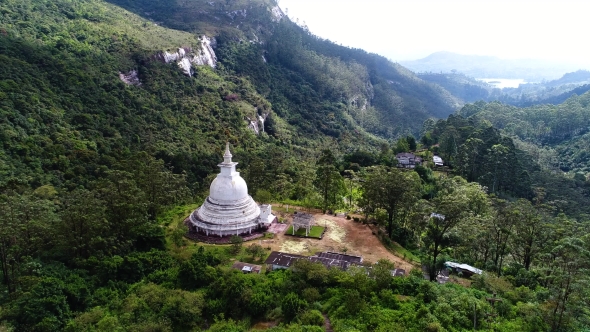 Aerial Top Shot of the Ancient Temple in Mountains of Adam Peak in Sri Lanka