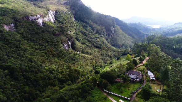 Aerial of Small Settlement in Mountains Near the Waterfall in Sri Lanka
