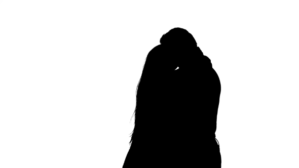 Pair of Lovers Kissing A White Background. Silhouette alt