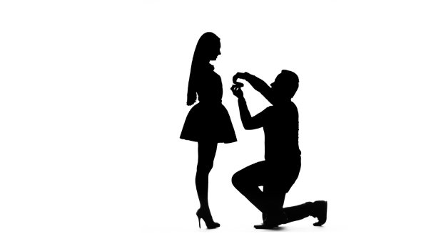 Guy Proposes To Marry the Girl, She Says Yes. Silhouette. White ...