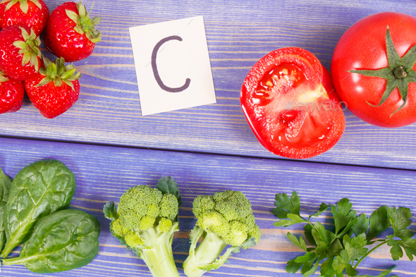 Fruits and vegetables containing vitamin C and minerals - Stock Photo - Images