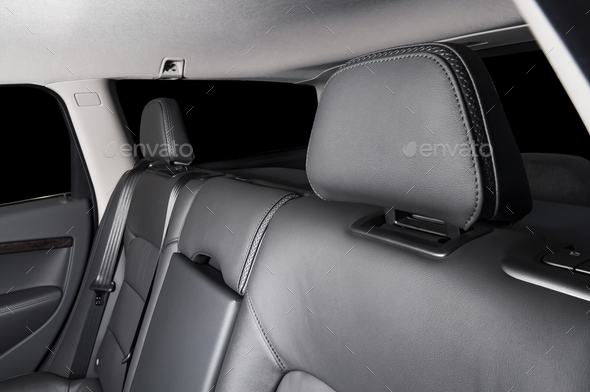 back seats of modern luxury car interior, black leather Stock Photo by  gargantiopa