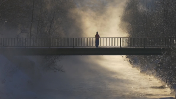 Woman on the Bridge in the Fog