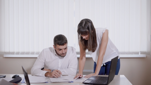 The Manager of a Large Consulting Firm Brings Documents alt