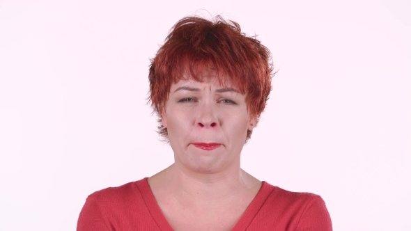 Red Haired Woman Screams, She Is Aggressively Attuned To Her Colleagues. White Background alt