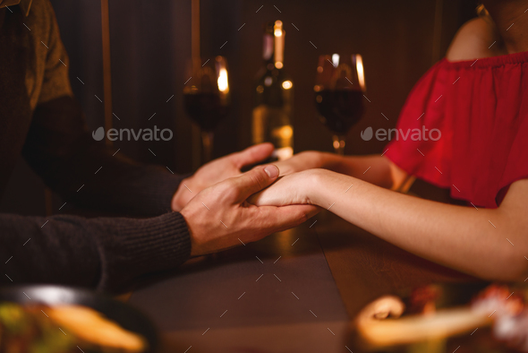 Love couple in restaurant, romantic evening Stock Photo by NomadSoul1